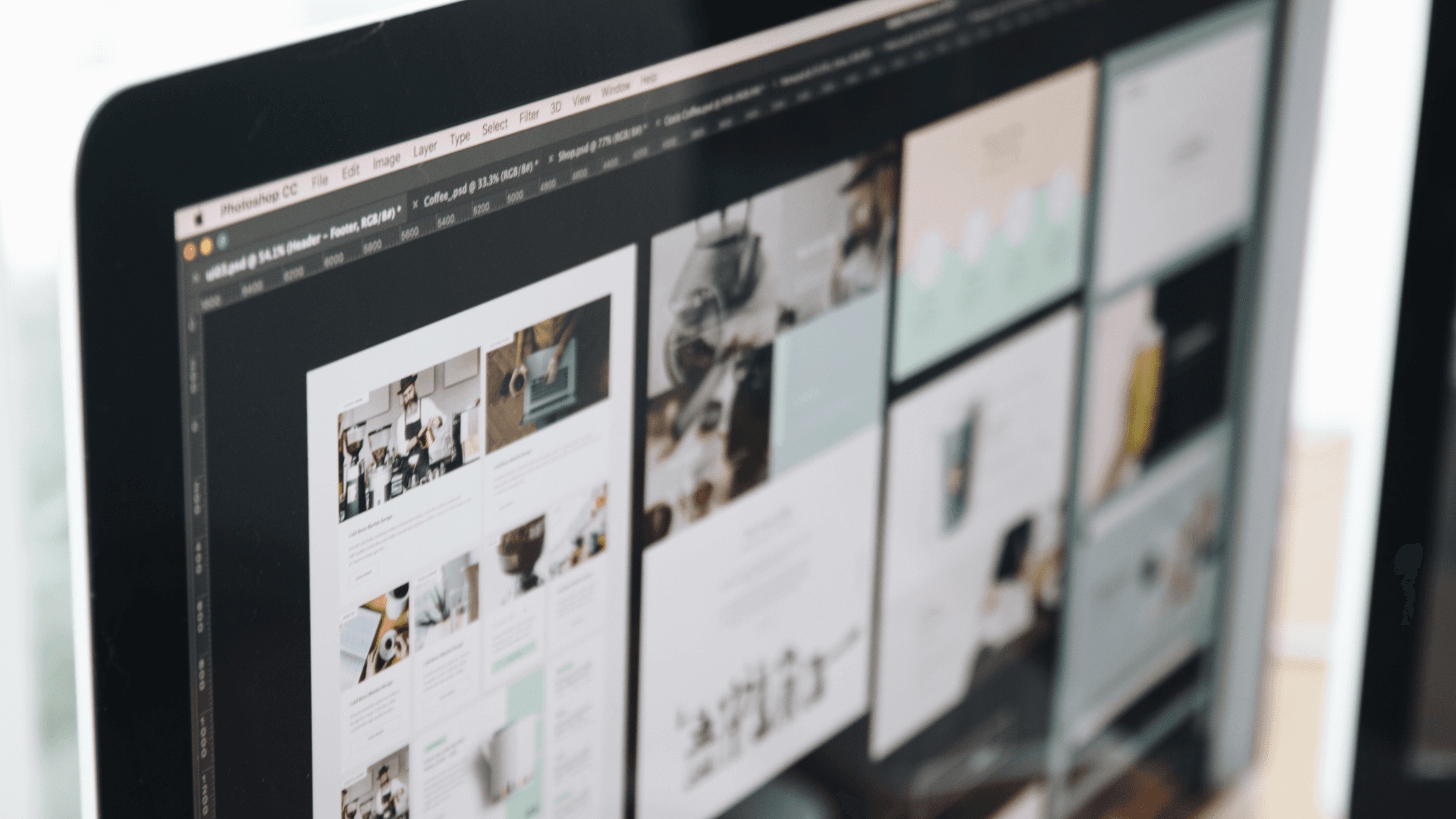 Website and brand designs laid out on a computer screen